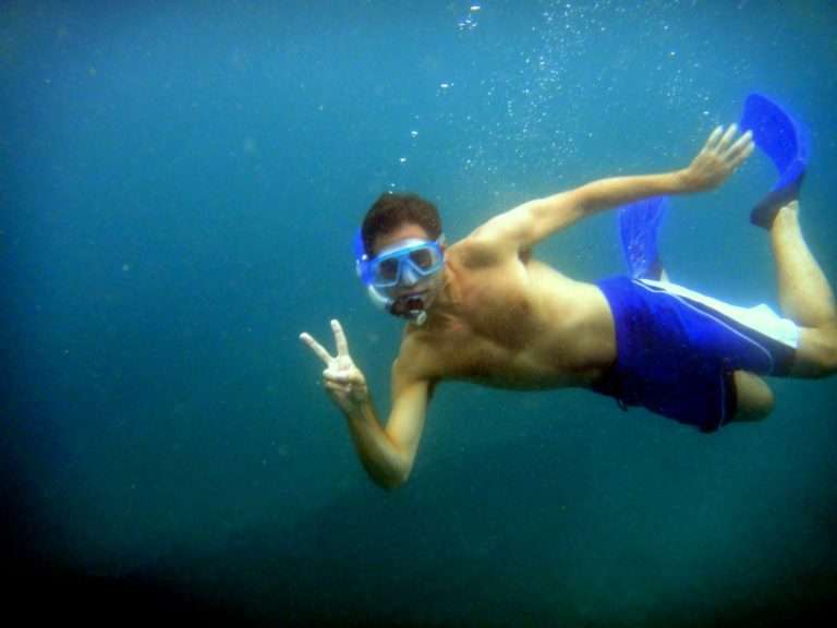 Travel blogger Visit50 while snorkeling in Malapascua, Island hopping in the Philippines